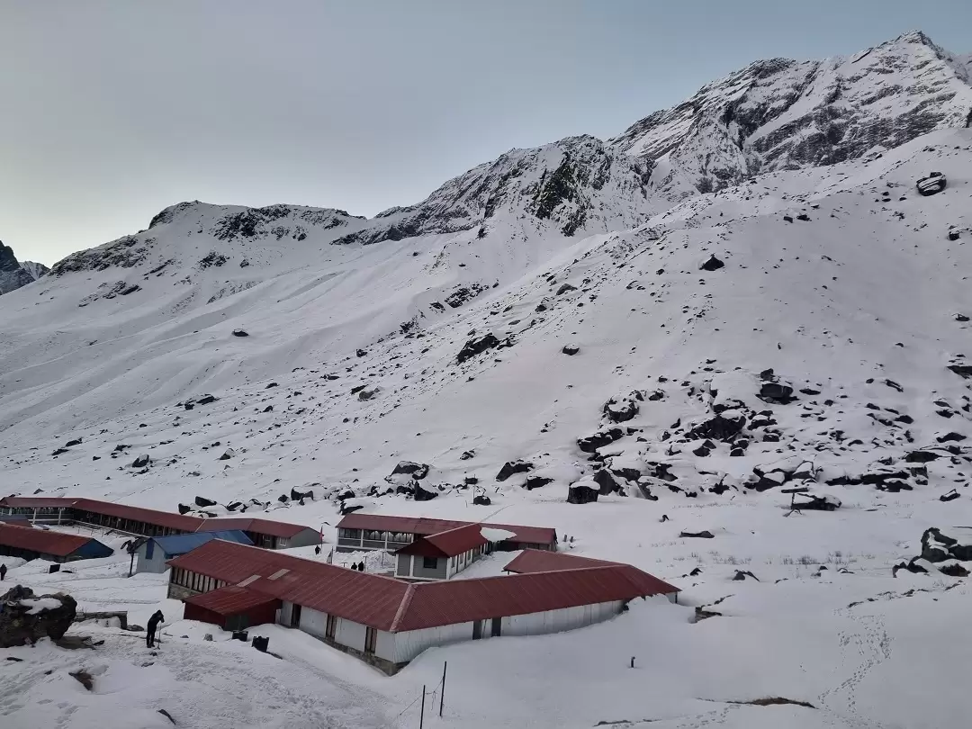 Trekkers gazing in awe at snow-capped Annapurna I, Nepal, from the Annapurna Base Camp Trek